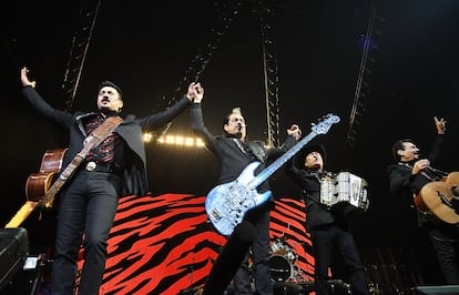 ORLANDO, FL - AUGUST 26:  (L-R) Luis Hernandez, Hernan Hernandez, Jorge Hernandez and Raul Hernandez of Los Tigres del Norte perform during 'Rompiendo Fronteras' tour at Amway Center on August 26, 2018 in Orlando, Florida. (Photo by Gerardo Mora/Getty Images)