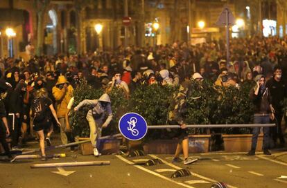 Thousands of protesters take to the streets of Barcelona to demonstrate against the Supreme Court ruling.