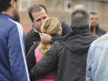 Family members gathered at the Pozo Emilio del Valle mine to await news of their loved ones. 