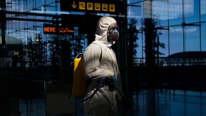 A member of the Military Emergencies Unit carries out a general disinfection at Malaga airport on March 16.