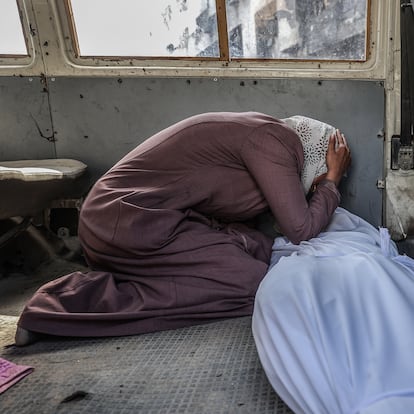 GAZA CITY, GAZA - JUNE 4: Palestinians mourn their loss near bodies killed in Israeli attack on makeshift tents for displaces civilians in Gaza City, Gaza on June 04, 2025. Bodies were brought to Al Shifa Hospital for identification before burial. (Photo by Ali Jadallah/Anadolu via Getty Images)