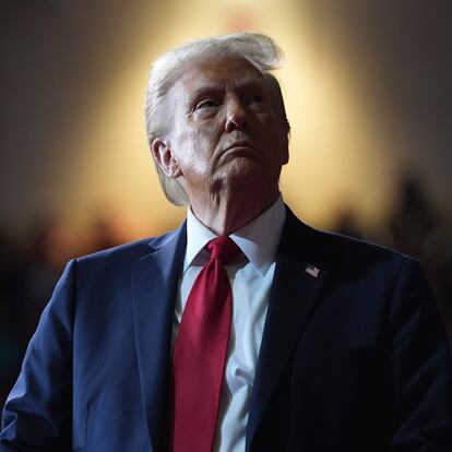 Republican presidential nominee former President Donald Trump watches a video screen at a campaign rally at the Salem Civic Center, Saturday, Nov. 2, 2024, in Salem, Va. (AP Photo/Evan Vucci)