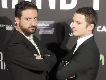 Eugenio Mira (izquierda) y Elijah Wood, en el preestreno de 'Grand piano'.