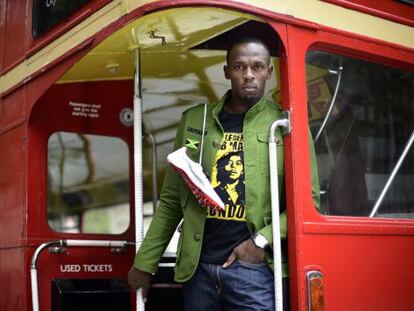 Usain Bolt, en una sesión de fotos por las calles de Londres.