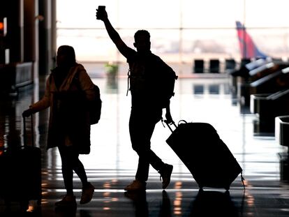 People pass through Salt Lake City International Airport on January 11, 2023, in Salt Lake City.