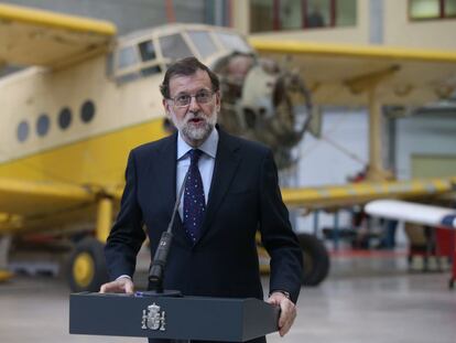 Acting Prime Minister Mariano Rajoy speaks at a professional training center on Thursday.