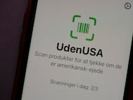 Primer plano de un móvil con la aplicación UdenUsa.