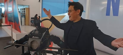 Dennis Hong, founder of RoMeLa, alongside the Artemis robot at the Gitex Global in Dubai.