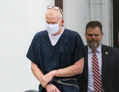 Alex Murdaugh is escorted out of the Colleton County Courthouse in Walterboro, S.C., on July 20, 2022. Murdaugh's trial on two counts of murder in the June 2021 deaths of his wife and son is scheduled to start Monday, Jan. 23, 2023.