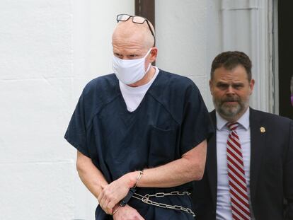 Alex Murdaugh is escorted out of the Colleton County Courthouse in Walterboro, S.C., on July 20, 2022. Murdaugh's trial on two counts of murder in the June 2021 deaths of his wife and son is scheduled to start Monday, Jan. 23, 2023.