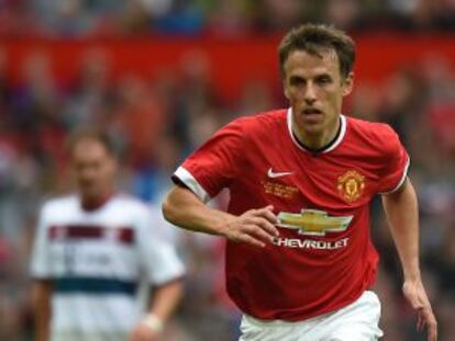 Phil Neville, en un partido amistoso con el Manchester United.