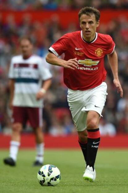 Phil Neville, en un partido amistoso con el Manchester United.