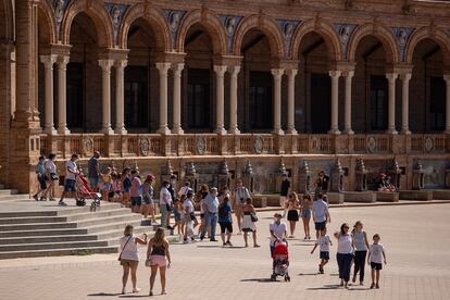 Tourists in Seville's Plaza de España on September 3.