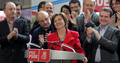 Louro, Rodríguez y Caballero, en la primera fila, aplauden la intervención de Espinosa.