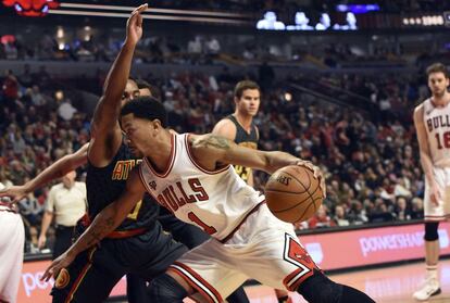 Derrick Rose y Jeff Teague.