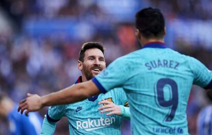 Messi y Suárez celebran un gol con el Barcelona.