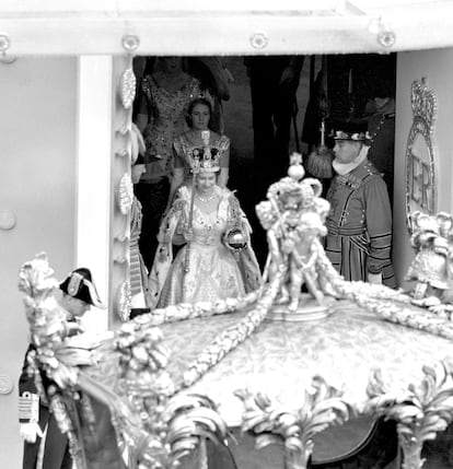 Queen Elizabeth II, as she prepares to enter her State Coach at Westminster Abbey and return to Buckingham Palace after the Coronation ceremony.  