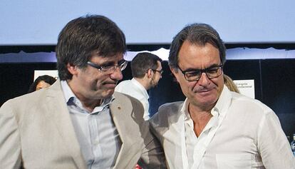 Carles Puigdemont y Artur Mas despu&eacute;s de dar a conocer el nombre de Partit Dem&oacute;crata Catal&agrave; (PDC).