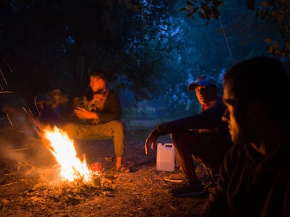 The group of survivors of the Aug. 12 shipwreck in the English Channel in a forest in Calais, northern France, on Aug. 17, 2023.