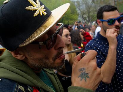 A young man smokes a joint in New York.