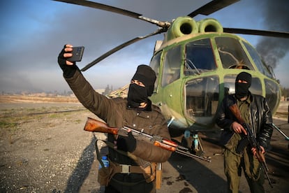 Militiamen at a military airport in Aleppo province on Monday.