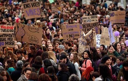 Slogans on display during the March 8 protest in Barcelona.