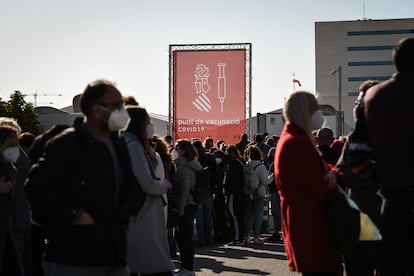 People wait in line to be vaccinated against Covid-19 in Valencia earlier this week.