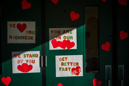 FILE - Messages of support for teacher Abby Zwerner, who was shot by a 6-year-old student, grace the front door of Richneck Elementary School Newport News, Va. on Jan. 9, 2023.  Zwerner said Monday, March 20, that she has had four surgeries and has gone through a challenging recovery.