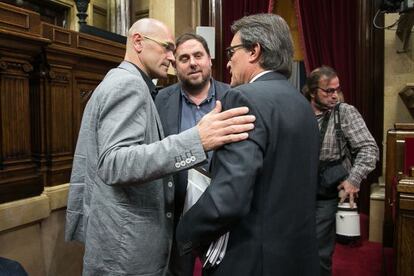 Ra&uuml;l Romeva, Oriol Junqueras y Artur Mas en el Parlament. 