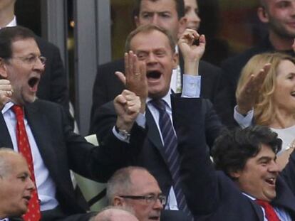 Prime Minister Mariano Rajoy (left) celebrates Spain&#039;s goal during the 1-1 tie with Italy in Gdansk.