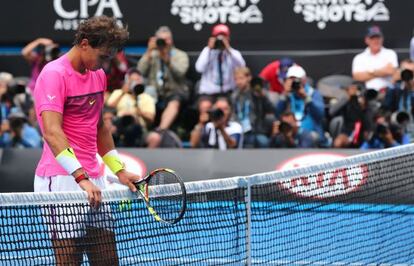 Nadal espera Berdych a la xarxa després de perdre el partit.