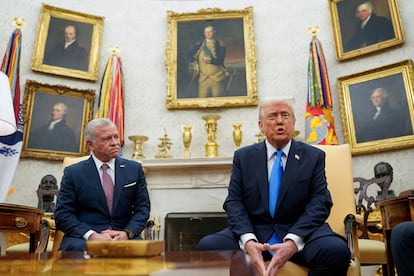 US President Donald Trump, in an Oval Office meeting with King Abdullah of Jordan, surrounded by portraits of some of his predecessors.