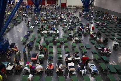 Desabrigados pelo furacão Harvey são atendidos na George Brown Convention Center, em Houston.