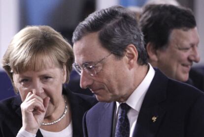 Merkel, Draghi y Durão Barroso, en Cannes, en la cumbre del G-20 del 4 de noviembre.