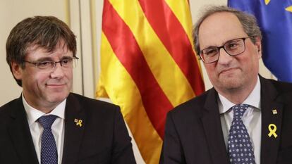 Carles Puigdemont y Quim Torra durante una rueda de prensa este lunes en Bruselas.