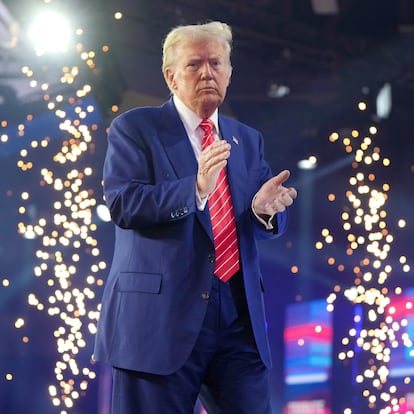 President-elect Donald Trump speaks at AmericaFest, Sunday, Dec. 22, 2024, in Phoenix. (AP Photo/Rick Scuteri)