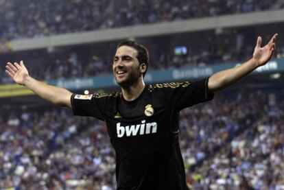 Higuaín celebrates after scoring the second of his three goals against Espanyol.