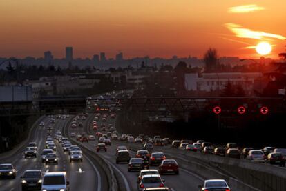 Pollution envelops Madrid, as car congestion rumbles on below.