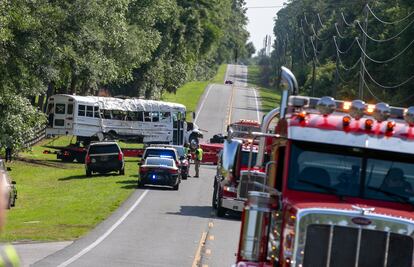 A truck carrying 50 migrants to work overturned after colliding with a pickup truck, killing eight of them, on May 14 in Florida.