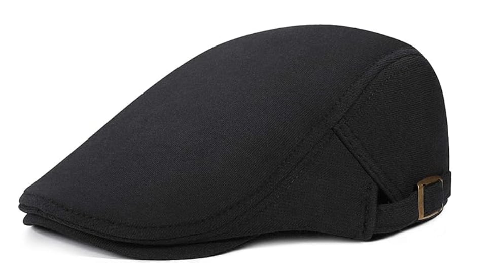 Boina con hebilla metálica ajustable.