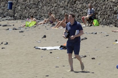 British Prime Minister David Cameron on a beach in Lanzarote, where he also spent his Easter break two years ago.