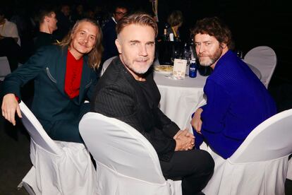 Gary Barlow, Mark Owen y Howard Donald, de la banda Take That.