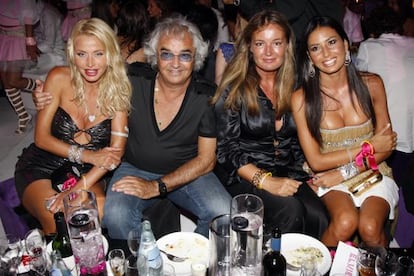 Flavio Briatore (second from left) in the Puerto Cervo, Sardinia, branch of Billionaire club.