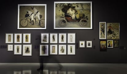 Artist Ramon Casas and his friend Pere Romeu on a tandem and in a car above drawings of the artists who frequented the Els Quatre Gats bar.