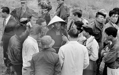 Press members interview a witness of the massacre, in My Lai, on Dec. 3, 1969