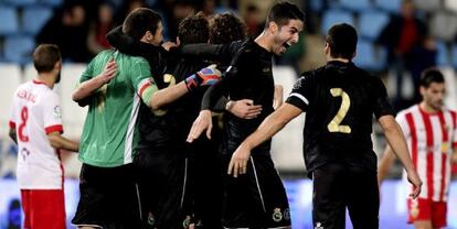 Los jugadores del Racing celebran la clasificacin.