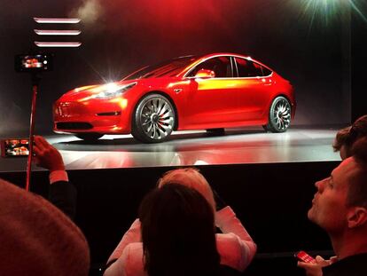 A Tesla Model 3 sedan, its first car aimed at the mass market, is displayed during its launch in Hawthorne, California, U.S. March 31, 2016. REUTERS/Joe White -