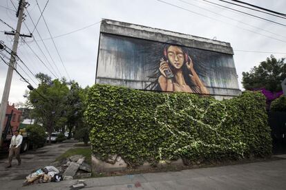 Mural de Café Olé, uno de los patrocinadores del festival. Ubicado en la calle Manzanillo, 131.