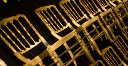 Gold-painted chairs at Madrid antique store L. A. Studio.