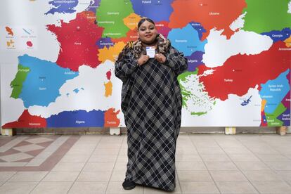 Mouslimati Boina-Mze, 24, no children, going through a divorce, poses with her voting card on February 10, 2017 at her school in Marseille, southern France, where she is doing training at a college for people who have left school without qualifications.
What should be the priorities of the next French president?
"What I want from the new president is that he help young people to find work easily. It's hard, it really is. Today, even if you leave school with qualifications, you can only find a job that is badly-paid or demotivating. A job is the most important thing \x96- to pay the bills but also to be independent, to want to get up in the morning to do a job. What the new president needs to do is improve information for young people. Many people don't even know that there are local training centres for them. They stop everything and it's a shame." / AFP PHOTO / ANNE-CHRISTINE POUJOULAT / RESTRICTED TO EDITORIAL USE - RESTRICTED TO FRENCH ELECTIONS ILLUSTRATION PURPOSE